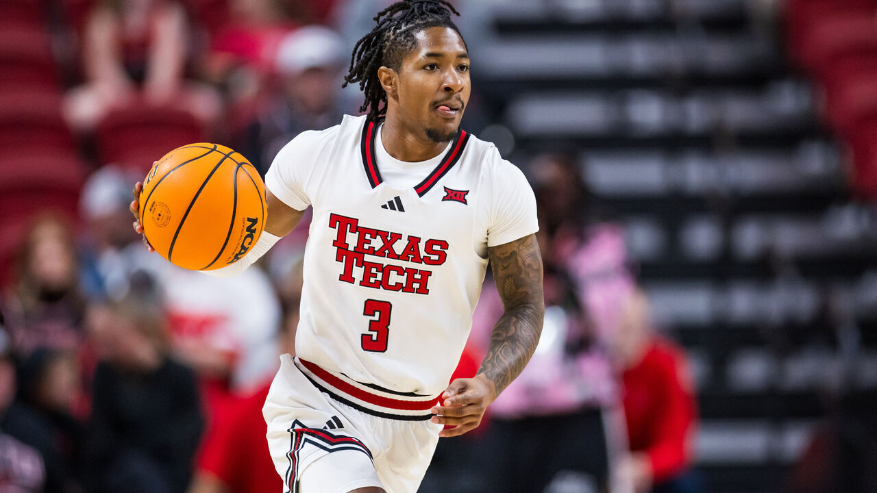 LUBBOCK, TEXAS - NOVEMBER 13: Elijah Hawkins #3 of the Texas Tech Red Raiders handles the ball during the first half of the game against the Wyoming Cowboys at United Supermarkets Arena on November 13, 2024 in Lubbock, Texas.