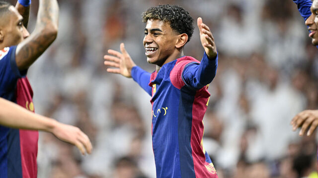 MADRID, SPAIN - OCTOBER 26: Lamine Yamal of Barcelona celebrates with his teammates after scoring a goal during LaLiga football match between Real Madrid and Barcelona at Santiago Bernabeu in Madrid, Spain on October 26, 2024.