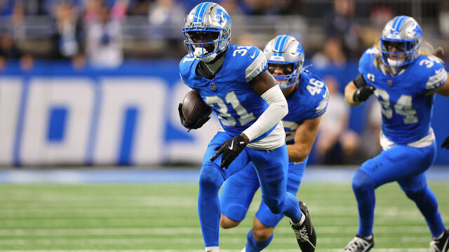 DETROIT, MICHIGAN - OCTOBER 27: Kerby Joseph #31 of the Detroit Lions returns an interception in the second quarter of a game against the Tennessee Titans at Ford Field on October 27, 2024 in Detroit, Michigan.