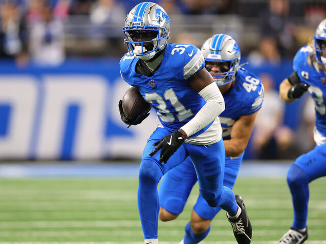 DETROIT, MICHIGAN - OCTOBER 27: Kerby Joseph #31 of the Detroit Lions returns an interception in the second quarter of a game against the Tennessee Titans at Ford Field on October 27, 2024 in Detroit, Michigan.