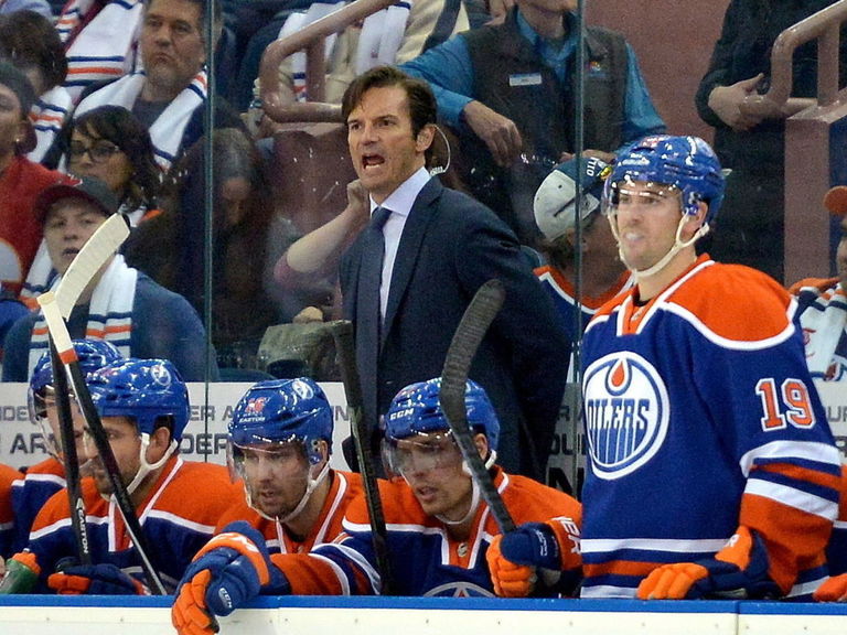 PHOTO Oilers fan throws sweater on the ice, loses cell phone