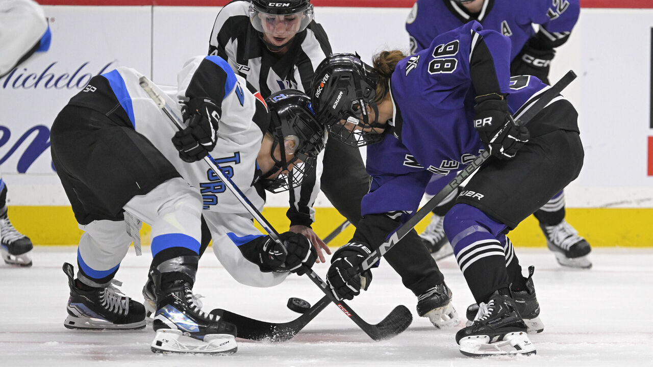 ST. PAUL, MN - MAY 13: Toronto forward Emma Maltais (27) and Minnesota forward Michela Cava (86) face-off during the second period of game three of a PWHL semifinal between Minnesota and Toronto on May 13th, 2024 at the Xcel Energy Center in St. Paul,MN.