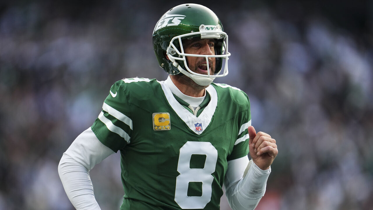 EAST RUTHERFORD, NJ - NOVEMBER 17: Aaron Rodgers #8 of the New York Jets celebrates during an NFL football game against the Indianapolis Colts at MetLife Stadium on November 17, 2024 in East Rutherford, New Jersey.