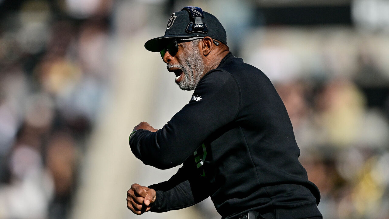 BOULDER, CO - NOVEMBER 16: Head coach Deion Sanders of the Colorado Buffaloes directs his team in the first half of a game against the Utah Utes at Folsom Field on November 16, 2024 in Boulder, Colorado.