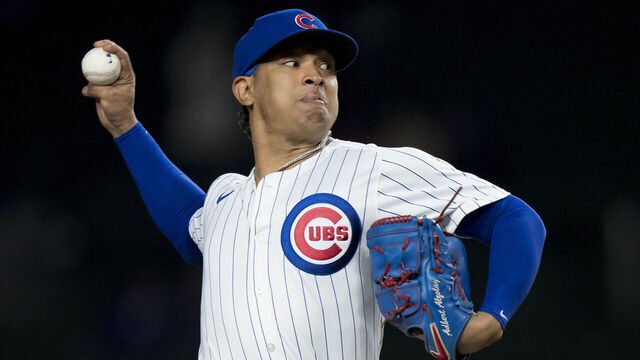 CHICAGO, IL - APRIL 3: Adbert Alzolay of the Chicago Cubs pitches in a game against the Colorado Rockies at Wrigley Field on April 3, 2024 in Chicago, Illinois.