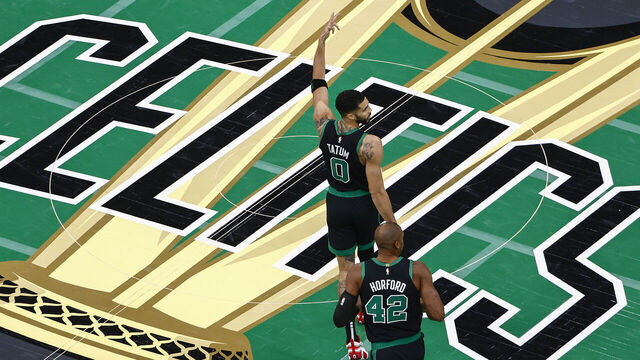 BOSTON, MASSACHUSETTS - NOVEMBER 19: Jayson Tatum #0 of the Boston Celtics reacts to a basket alongside teammate Al Horford #42 against the Cleveland Cavaliers during the second quarter of the Emirates NBA Cup at TD Garden on November 19, 2024 in Boston, Massachusetts.