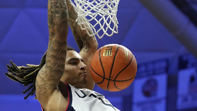 STORRS, CONNECTICUT - NOVEMBER 19: Solo Ball #1 of the Connecticut Huskies dunks during the first half of an NCAA basketball game at the Harry A. Gampel Pavilion on November 19, 2024 in Storrs, Connecticut. The Huskies defeated the Lions 81-46.