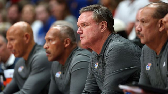 LAWRENCE, KANSAS - NOVEMBER 19: Head coach Bill Self of the Kansas Jayhawks watches from the bench during the first half of the game against the North Carolina-Wilmington Seahawks at Allen Fieldhouse on November 19, 2024 in Lawrence, Kansas.