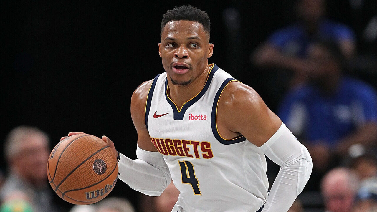 MEMPHIS, TENNESSEE - NOVEMBER 19: Russell Westbrook #4 of the Denver Nuggets brings the ball upcourt during the first half of the Emirates NBA Cup against the Memphis Grizzlies at FedExForum on November 19, 2024 in Memphis, Tennessee.