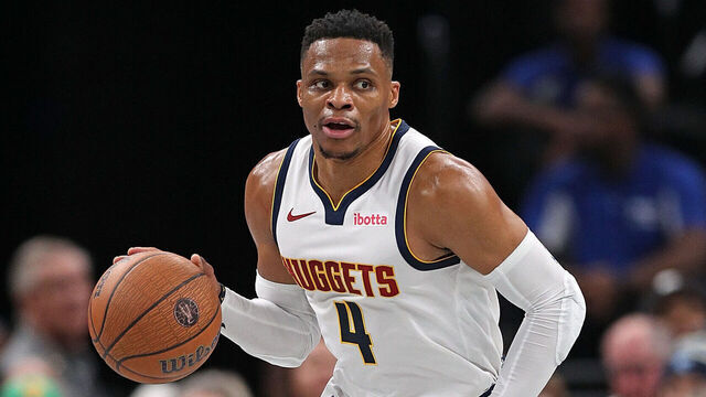 MEMPHIS, TENNESSEE - NOVEMBER 19: Russell Westbrook #4 of the Denver Nuggets brings the ball upcourt during the first half of the Emirates NBA Cup against the Memphis Grizzlies at FedExForum on November 19, 2024 in Memphis, Tennessee.
