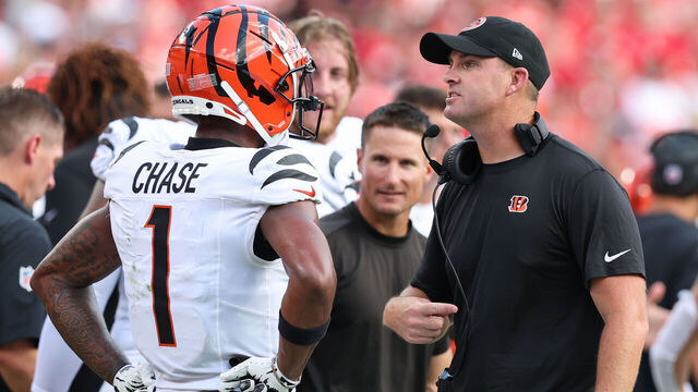 KANSAS CITY, MO - SEPTEMBER 15: Cincinnati Bengals head coach Zac Taylor talks with wide receiver Ja'Marr Chase (1) in the second quarter of an NFL game between the Cincinnati Bengals and Kansas City Chiefs on September 15, 2024 at GEHA Field at Arrowhead Stadium in Kansas City, MO.