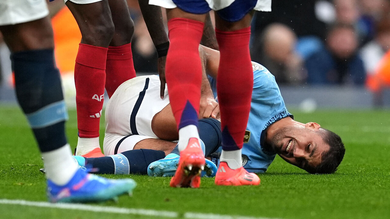 Manchester City's Rodri appears injured before being substituted during the Premier League match at the Etihad Stadium, Manchester. Manchester City have revealed Rodri has suffered ligament damage to his right knee, although the full extent of the injury remains unclear. Picture date: Sunday September 22, 2024.