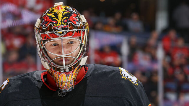 CALGARY, AB - NOVEMBER 19: Dustin Wolf #32 of the Calgary Flames skates against the New York Islanders at Scotiabank Saddledome on November 19, 2024 in Calgary, Alberta, Canada.