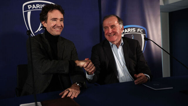 Paris FC's president Pierre Ferracci shakes hands with representative of the Agache family holding company Antoine Arnault after a press conference in Orly, northern suburb of Paris, on November 20, 2024. The family of France's richest person, Bernard Arnault, will complete the acquisition of Paris FC "in the coming days", the Ligue 2 club's president said during a press conference on November 20, 2024. The Arnault Family will become the majority shareholders of Paris FC, with Austrian company Red Bull also acquiring a minority share, once the necessary administrative procedures have all been finalised.