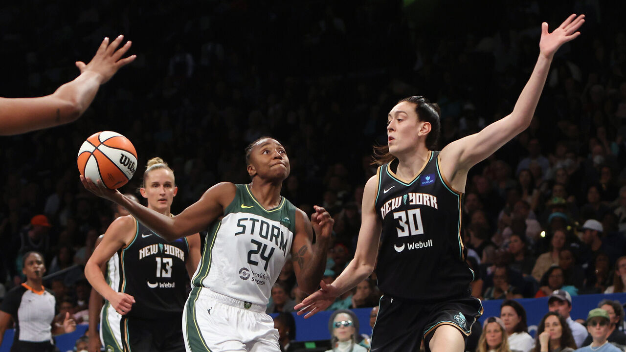NEW YORK, NEW YORK - SEPTEMBER 05: Breanna Stewart #30 of the New York Liberty defends against Jewell Loyd #24 of the Seattle Storm during the fourth quarter at Barclays Center on September 05, 2024 in the Brooklyn borough of New York City. The Liberty defeated the Storm 77-70.