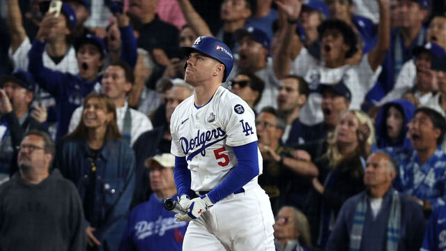 LOS ANGELES, CA - OCTOBER 25: Freddie Freeman #5 of the Los Angeles Dodgers hits a walk off grand slam during Game 1 of the 2024 World Series presented by Capital One between the New York Yankees and the Los Angeles Dodgers at Dodger Stadium on Friday, October 25, 2024 in Los Angeles, California.