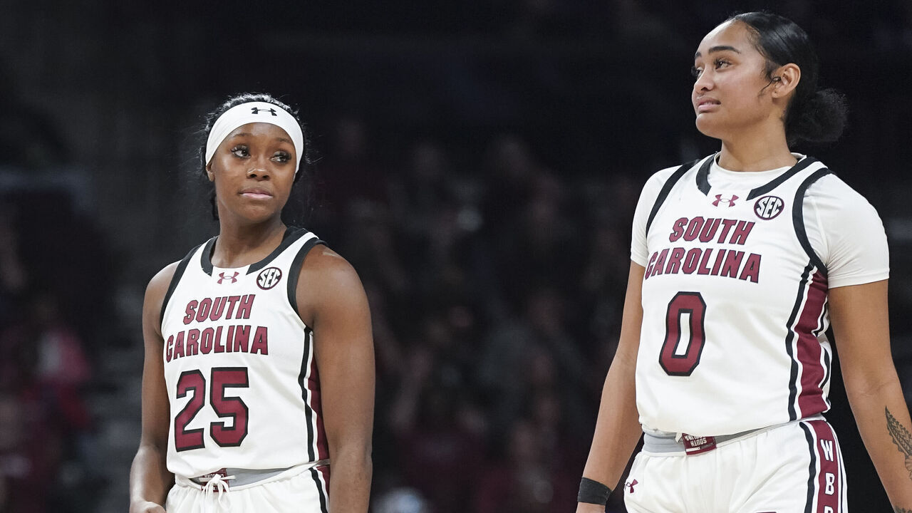 COLUMBIA, SOUTH CAROLINA - NOVEMBER 17: Raven Johnson #25 and Te-Hina Paopao #0 of the South Carolina Gamecocks stand near miid-court suing a free throw during the fourth quarter of an NCAA women's basketball game against the East Carolina Lady Pirates at Colonial Life Arena on November 17, 2024 in Columbia, South Carolina. The South Carolina Gamecocks won 95-44.