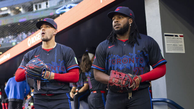 TORONTO, ON - MAY 31: Jose Berrios #17 and Vladimir Guerrero Jr. #27 of Toronto Blue Jays get ready to take the field against the Pittsburgh Pirates in their MLB game at the Rogers Centre on May 31, 2024 in Toronto, Ontario, Canada.