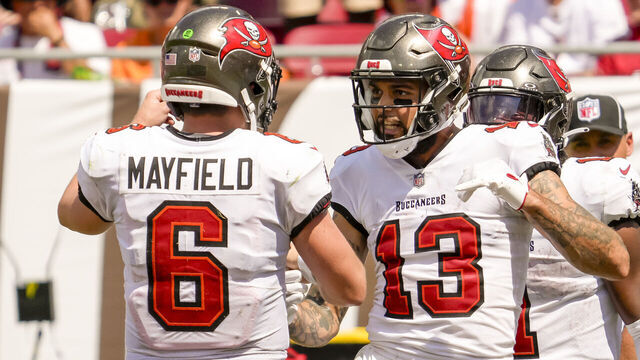 TAMPA, FL - SEPTEMBER 17: Tampa Bay Buccaneers wide receiver Mike Evans (13) scores a touchdown and celebrates with Tampa Bay Buccaneers quarterback Baker Mayfield (6) during the NFL Football match between the Tampa Bay Buccaneers and Chicago Bears on September 17, 2023 at TIAA Bank Field Stadium, FL.
