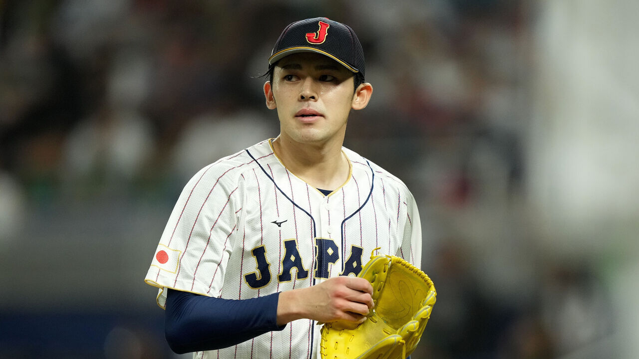 MIAMI, FLORIDA - MARCH 20: Roki Sasaki #14 of Team Japan walks off the mound at the end of the first inning against Team Me during the World Baseball Classic Semifinals at loanDepot park on March 20, 2023 in Miami, Florida.