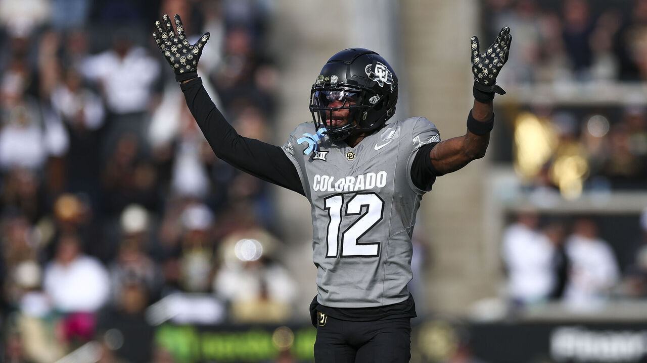 BOULDER, COLORADO - NOVEMBER 16: Travis Hunter #12 of the Colorado Buffaloes celebrates during the second half against the Utah Utes at Folsom Field on November 16, 2024 in Boulder, Colorado.