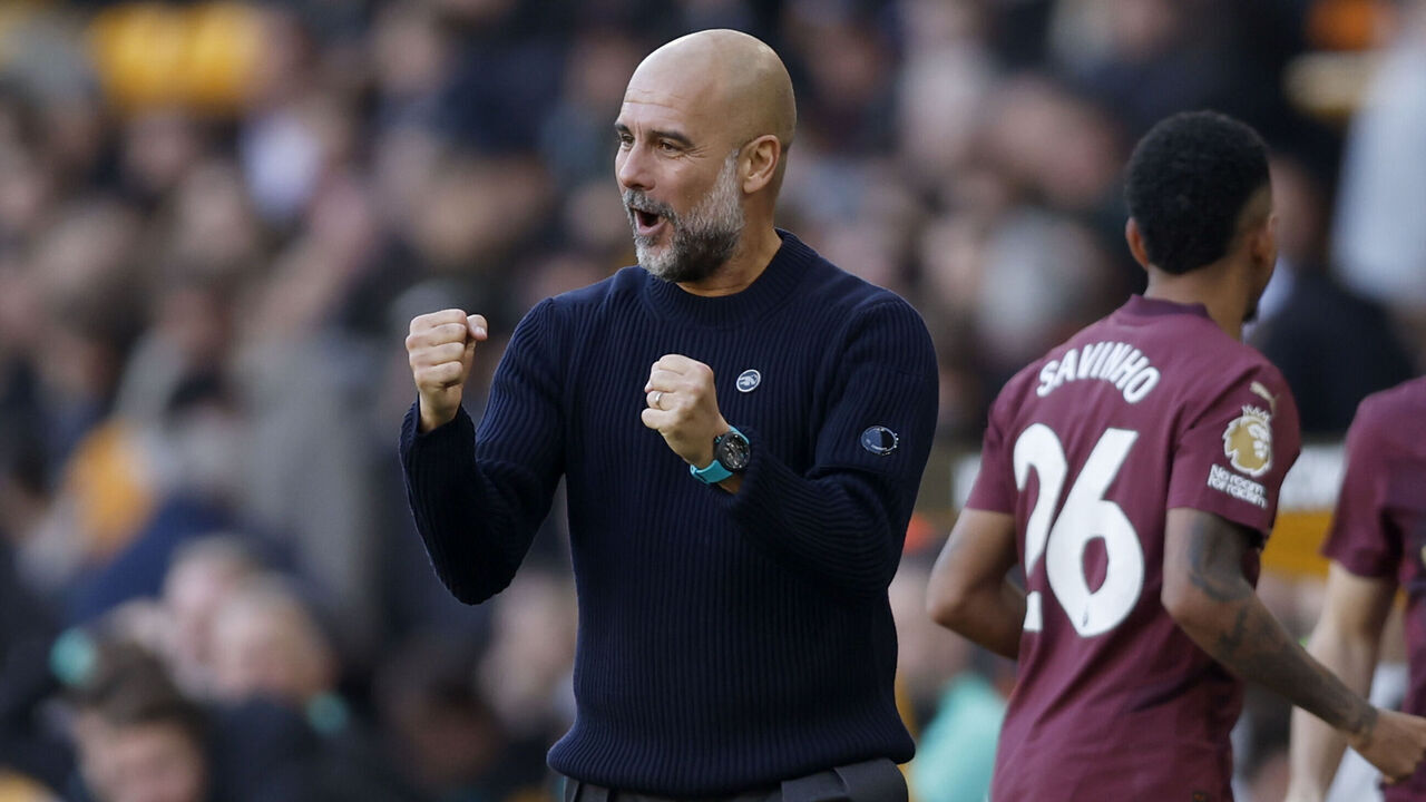 WOLVERHAMPTON, ENGLAND - OCTOBER 20: Pep Guardiola, Manager of Manchester City celebrates winning goal during the Premier League match between Wolverhampton Wanderers FC and Manchester City FC at Molineux on October 20, 2024 in Wolverhampton, England.