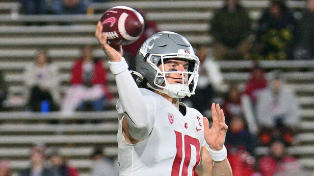 ALBUQUERQUE, NEW MEXICO - NOVEMBER 16: Quarterback John Mateer #10 of the Washington State Cougars passes against the New Mexico Lobos during the first half of a game at University Stadium on November 16, 2024 in Albuquerque, New Mexico.