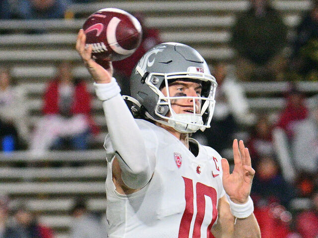 ALBUQUERQUE, NEW MEXICO - NOVEMBER 16: Quarterback John Mateer #10 of the Washington State Cougars passes against the New Mexico Lobos during the first half of a game at University Stadium on November 16, 2024 in Albuquerque, New Mexico.