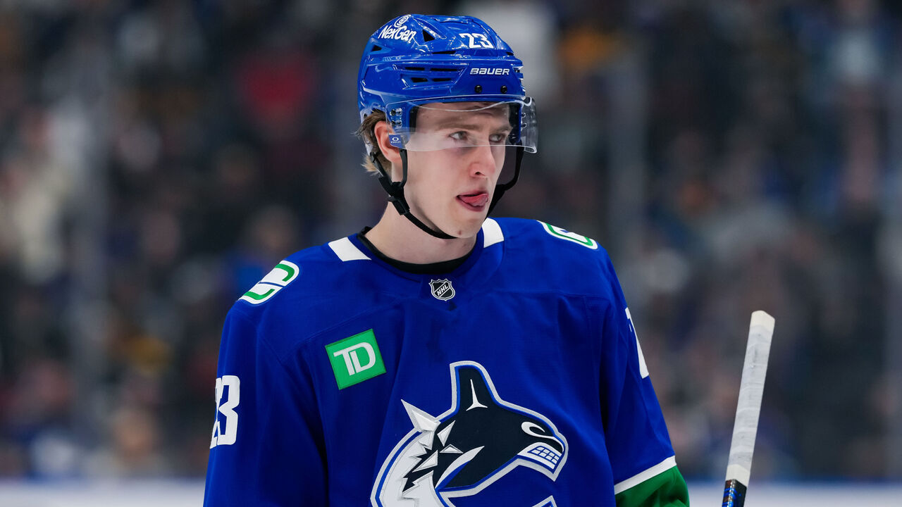 VANCOUVER, CANADA - NOVEMBER 14: Jonathan Lekkerimaki #23 of the Vancouver Canucks looks on during the first period of their NHL game against the New York Islanders at Rogers Arena on November 14, 2024 in Vancouver, British Columbia, Canada.