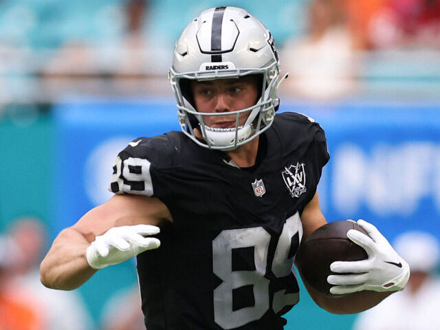 MIAMI GARDENS, FLORIDA - NOVEMBER 17: Brock Bowers #89 of the Las Vegas Raiders carries the ball against the Miami Dolphins during the third quarter of the game at Hard Rock Stadium on November 17, 2024 in Miami Gardens, Florida.