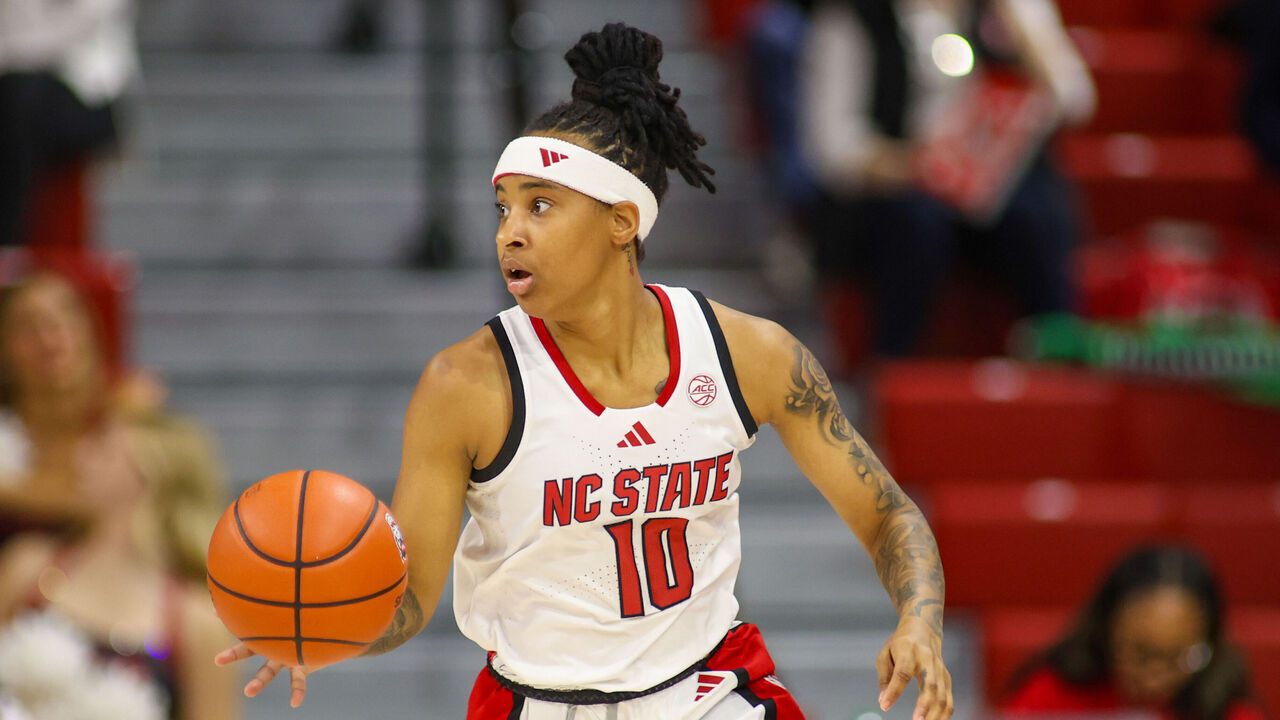 RALEIGH, NC - NOVEMBER 14: NC State Wolfpack guard Aziaha James (10) brings the ball up court during the college basketball game between the NC State Wolfpack and the Kent State Golden Flashes on November 14, 2024 at Reynolds Coliseum in Raleigh, NC.