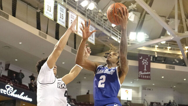 CHARLESTON, SC - NOVEMBER 21: Chaunce Jenkins #2 of the Seton Hall Pirates drives to the basket past Jack Clark #4 of the Virginia Commonwealth Rams in the second half during the Shriners Children's Charleston Classic college basketball game at TD Arena on November 21, 2024 in Charleston, South Carolina.