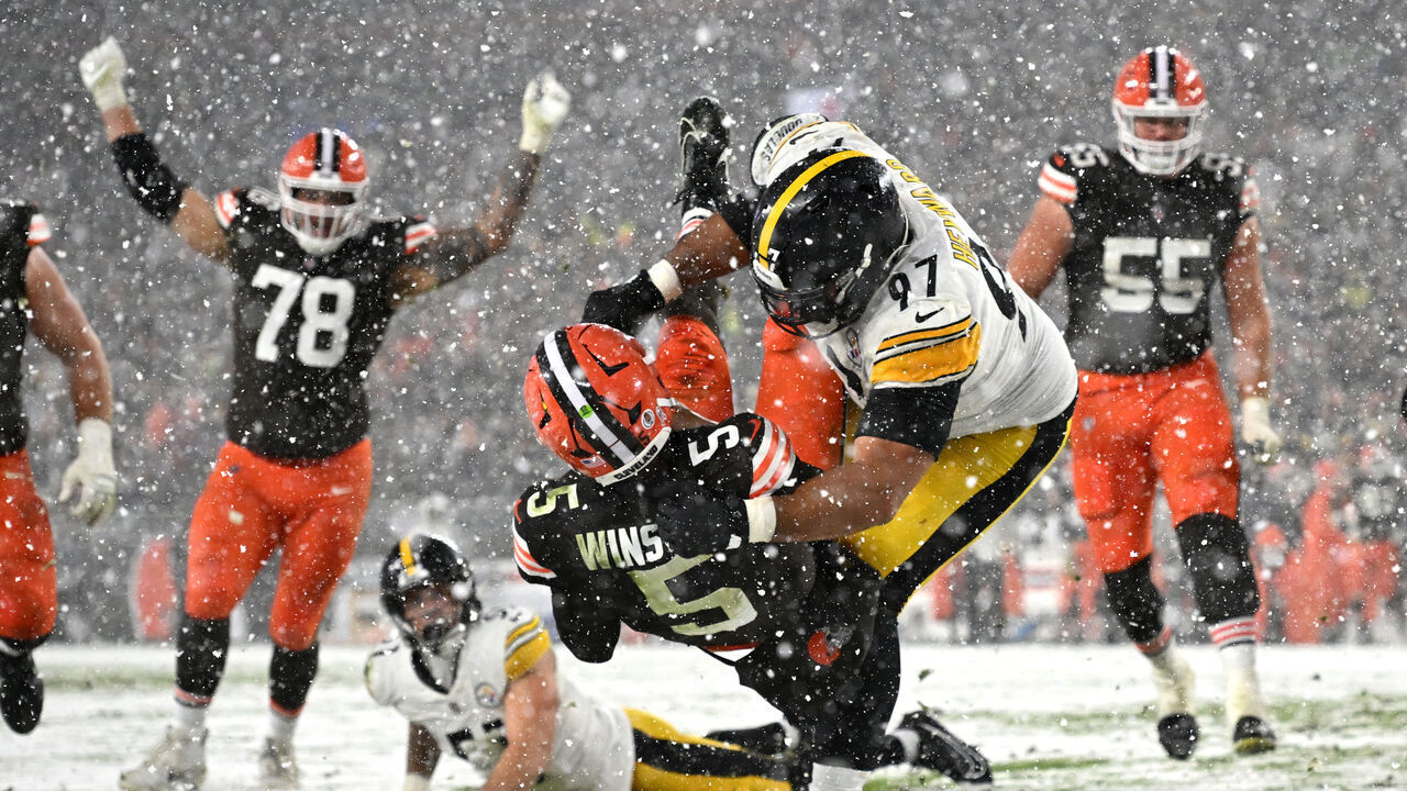 CLEVELAND, OHIO - NOVEMBER 21: Jameis Winston #5 of the Cleveland Browns scores a 2 yard touchdown against Cameron Heyward #97 of the Pittsburgh Steelers during the fourth quarter in the game at Huntington Bank Field on November 21, 2024 in Cleveland, Ohio.