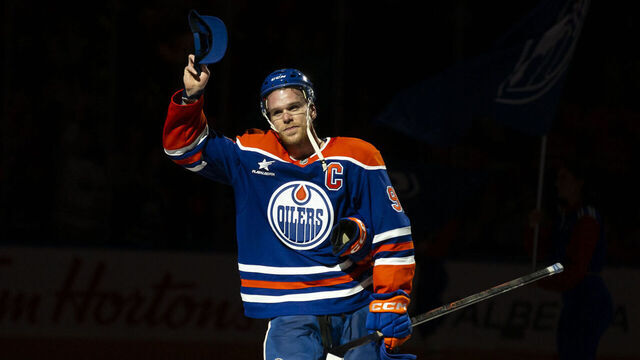 EDMONTON, CANADA - NOVEMBER 14: Connor McDavid #97 of the Edmonton Oilers is given first star of the game after scoring his 1,000th NHL point following the game against the Nashville Predators at Rogers Place on November 14, 2024 in Edmonton, Canada.
