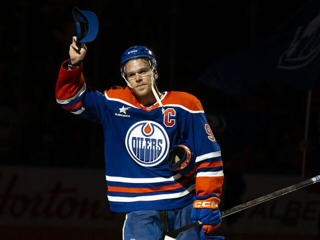 EDMONTON, CANADA - NOVEMBER 14: Connor McDavid #97 of the Edmonton Oilers is given first star of the game after scoring his 1,000th NHL point following the game against the Nashville Predators at Rogers Place on November 14, 2024 in Edmonton, Canada.