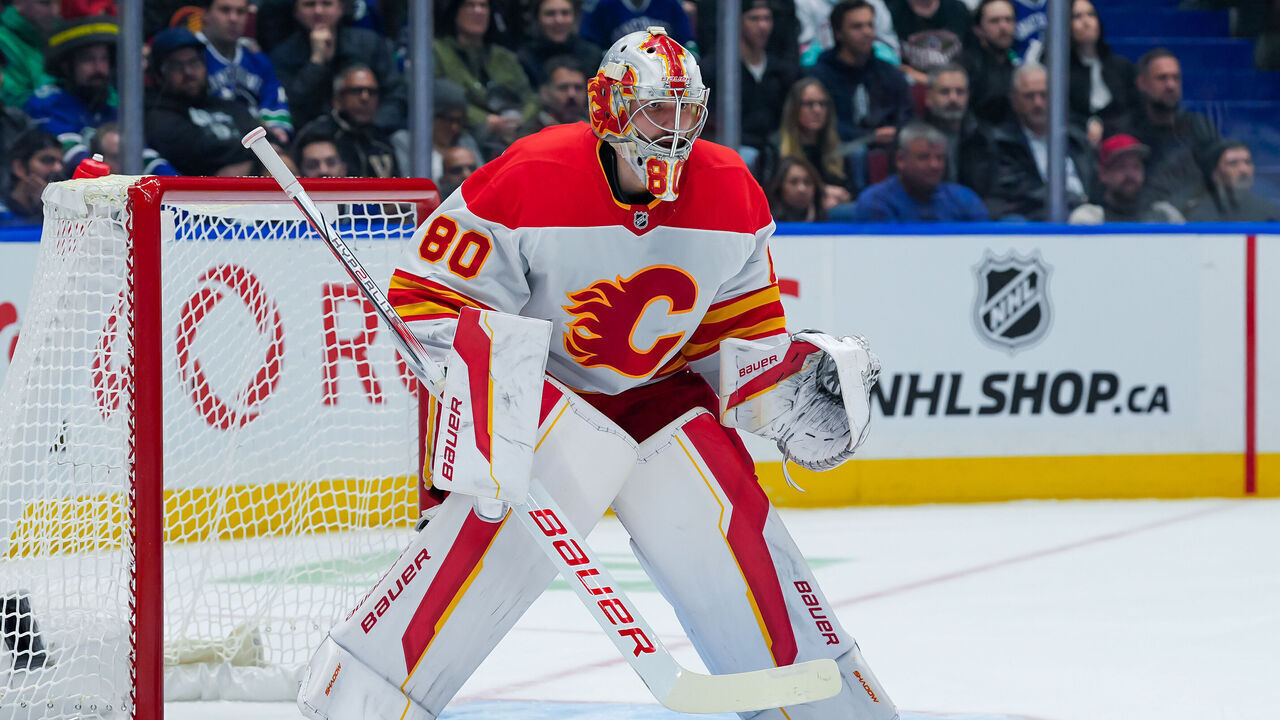 VANCOUVER, CANADA - NOVEMBER 12: Dan Vladar #80 of the Calgary Flames in net during the first period of their NHL game against the Vancouver Canucks at Rogers Arena on November 12, 2024 in Vancouver, British Columbia, Canada.