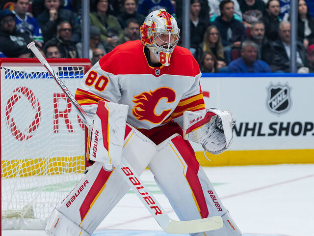 VANCOUVER, CANADA - NOVEMBER 12: Dan Vladar #80 of the Calgary Flames in net during the first period of their NHL game against the Vancouver Canucks at Rogers Arena on November 12, 2024 in Vancouver, British Columbia, Canada.