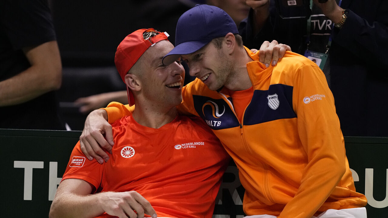 MALAGA, SPAIN - NOVEMBER 22: Tallon Griekspoor of Team Netherlands celebrates the victory with Botic van de Zandschulp after winning his singles match against Jan-Lennard Struff of Team Germany during the Semi-Final tie between Germany and Netherlands during the Davis Cup Final at Palacio de Deportes Jose Maria Martin Carpena on November 22, 2024 in Malaga, Spain.