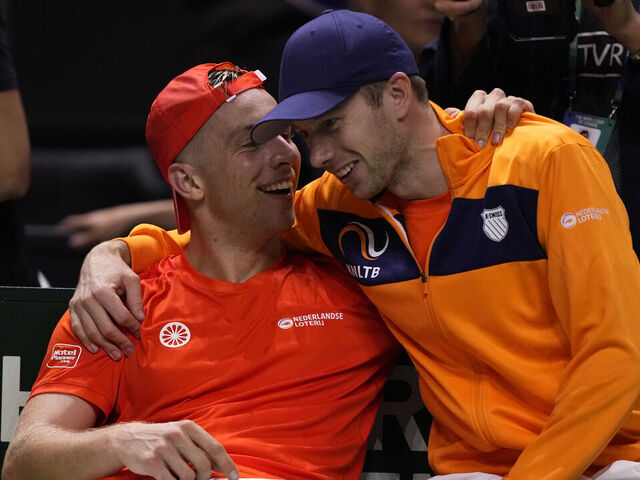 MALAGA, SPAIN - NOVEMBER 22: Tallon Griekspoor of Team Netherlands celebrates the victory with Botic van de Zandschulp after winning his singles match against Jan-Lennard Struff of Team Germany during the Semi-Final tie between Germany and Netherlands during the Davis Cup Final at Palacio de Deportes Jose Maria Martin Carpena on November 22, 2024 in Malaga, Spain.