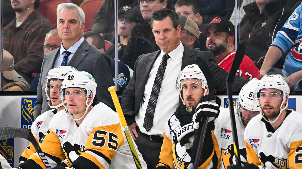 MONTREAL, CANADA - OCTOBER 14: Assistant coach Mike Vellucci and head coach Mike Sullivan of the Pittsburgh Penguins handle bench duties during the second period against the Montreal Canadiens at the Bell Centre on October 14, 2024 in Montreal, Quebec, Canada. The Pittsburgh Penguins defeated the Montreal Canadiens 6-3.