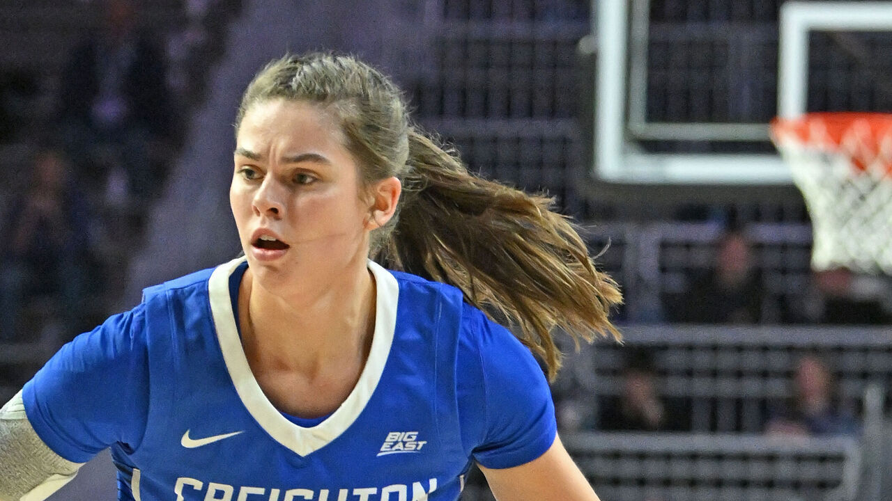 MANHATTAN, KS - NOVEMBER 14: Lauren Jensen #15 of the Creighton Bluejays dribbles against Zyanna Walker #1 of the Kansas State Wildcats in the second half at Bramlage Coliseum on November 14, 2024 in Manhattan, Kansas.