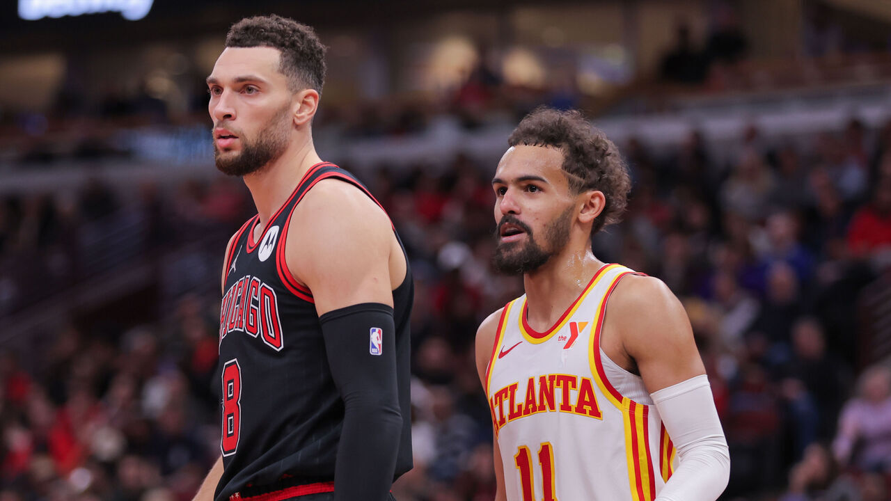 CHICAGO, IL - NOVEMBER 22: Zach LaVine #8 of the Chicago Bulls and Trae Young #11 of the Atlanta Hawks look on during the second half of the NBA In-Season Tournament against the Chicago Bulls on November, 22, 2024 at the United Center in Chicago, Illinois.