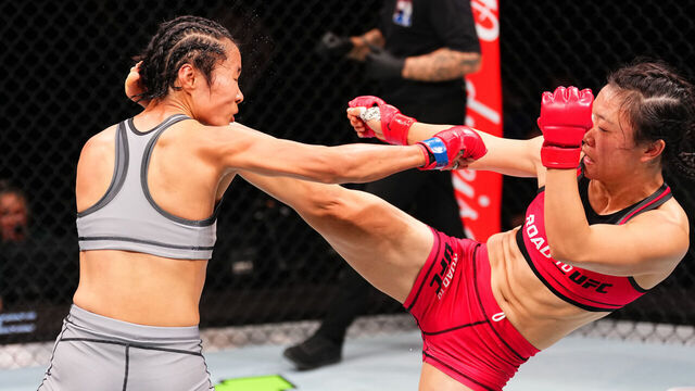 MACAU, CHINA - NOVEMBER 23: (R-L) Shi Ming of China kicks Feng Xiaocan of China in their Women’s Strawweight RTU Tournament Final fight during the UFC Fight Night event at Galaxy Arena on November 23, 2024 in Macau, China.