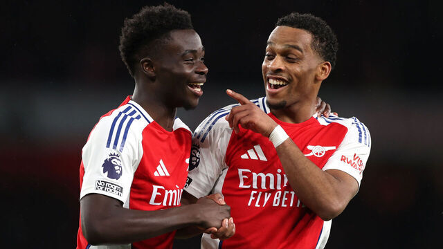 LONDON, ENGLAND - NOVEMBER 23: Jurrien Timber (right) celebrates after Bukayo Saka of Arsenal had assisted for the second goal during the Premier League match between Arsenal FC and Nottingham Forest FC at Emirates Stadium on November 23, 2024 in London, England.