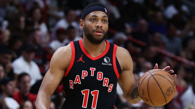 MIAMI, FLORIDA - APRIL 14: Bruce Brown #11 of the Toronto Raptors dribbles the ball against the Miami Heat during the fourth quarter of the game at Kaseya Center on April 14, 2024 in Miami, Florida.