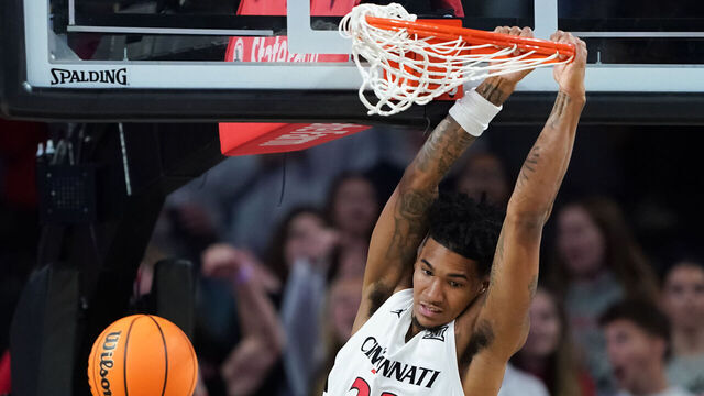 CINCINNATI, OHIO - NOVEMBER 15: Dillon Mitchell #23 of the Cincinnati Bearcats dunks the ball in the second half against the Nicholls Colonels at Fifth Third Arena on November 15, 2024 in Cincinnati, Ohio.
