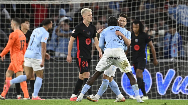 Celta Vigo's players celebrate their team's second goal during the Spanish league football match between RC Celta de Vigo and FC Barcelona at the Balaidos stadium in Vigo on November 23, 2024.