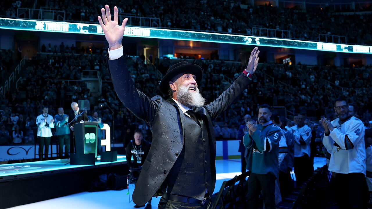 SAN JOSE, CALIFORNIA - NOVEMBER 23: Joe Thornton waves to the crowd following a ceremony honoring him and retiring his #19 jersey before the San Jose Sharks game against the Buffalo Sabres at SAP Center on November 23, 2024 in San Jose, California.