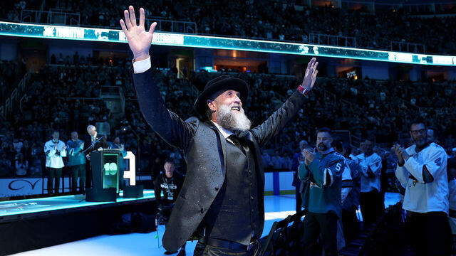 SAN JOSE, CALIFORNIA - NOVEMBER 23: Joe Thornton waves to the crowd following a ceremony honoring him and retiring his #19 jersey before the San Jose Sharks game against the Buffalo Sabres at SAP Center on November 23, 2024 in San Jose, California.