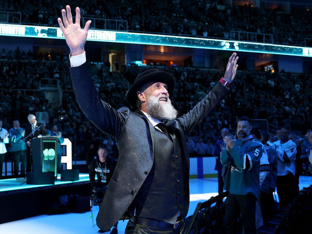 SAN JOSE, CALIFORNIA - NOVEMBER 23: Joe Thornton waves to the crowd following a ceremony honoring him and retiring his #19 jersey before the San Jose Sharks game against the Buffalo Sabres at SAP Center on November 23, 2024 in San Jose, California.